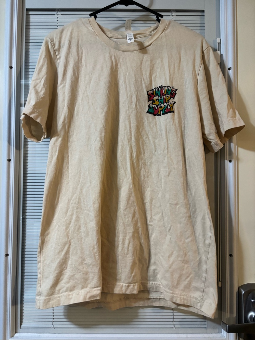 Bella Canvas Cream Short Sleeve Tee with Multicolor Chest Graphic